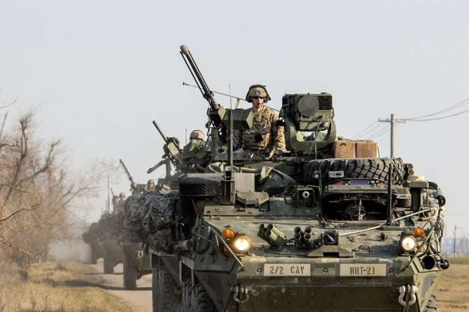 American troops march across Romania on their way to international drill