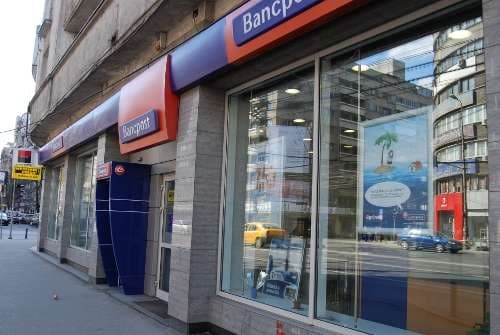 Romania's Bancpost returns to profit