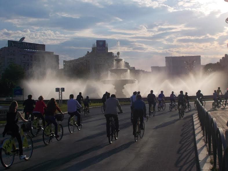 Hundreds of cyclists dressed in suits to ride their bikes in Bucharest this May