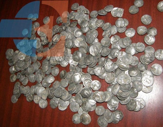 Local finds largest Dacian silver coin treasure in Romania