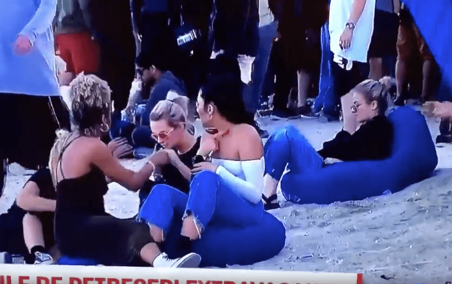 Young woman caught doing drugs during live TV news report in Romania