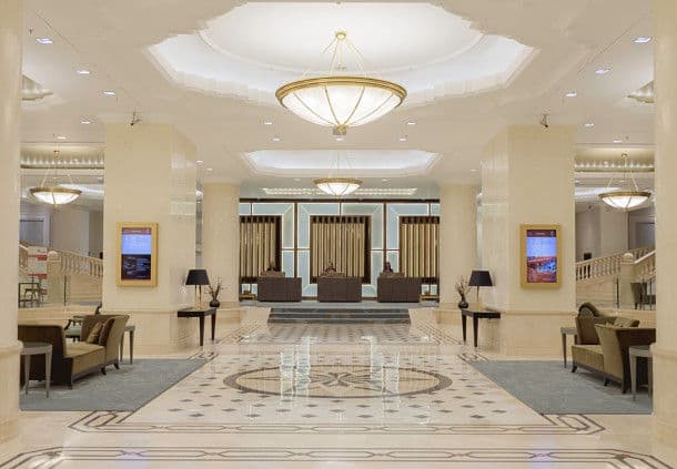 Who runs Bucharest’s five & four-star hotels?