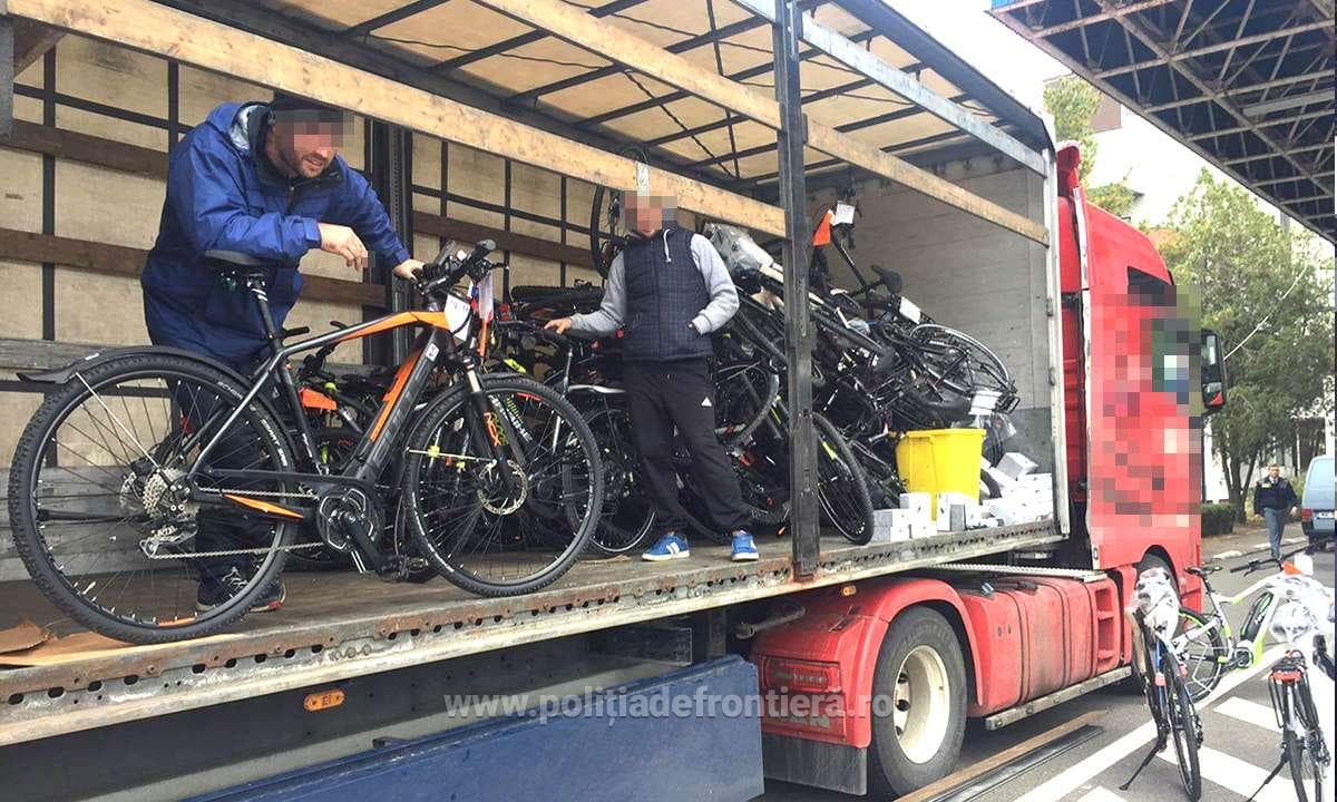 Romanian border policemen find dozens of stolen electric bikes hidden in a truck