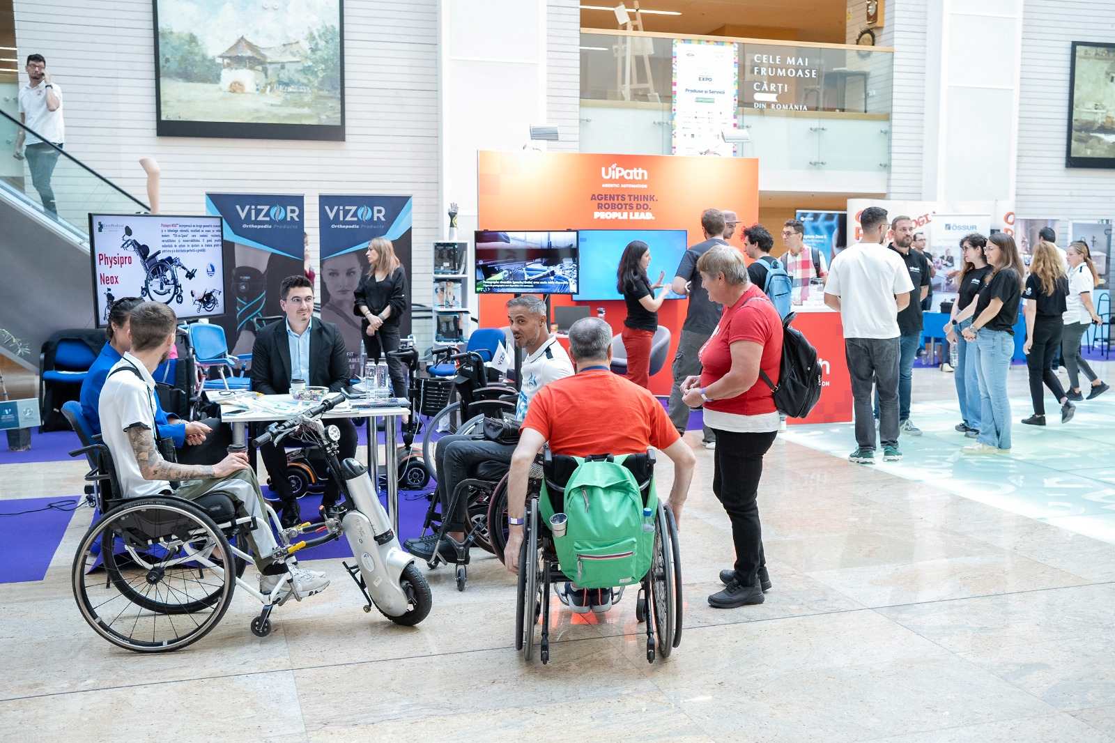 People in wheelchairs at AccessABILITY Expo.