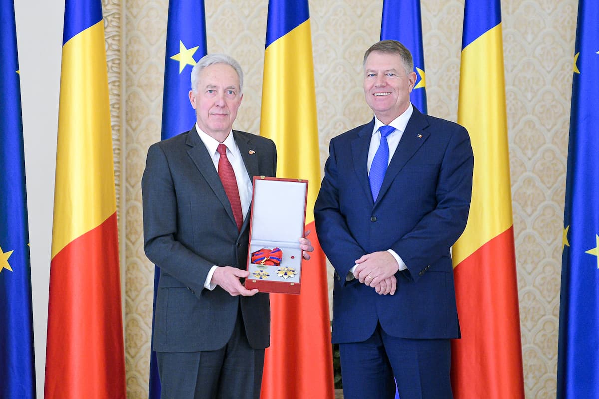 Romania’s president awards country’s highest order to departing U.S. ambassador