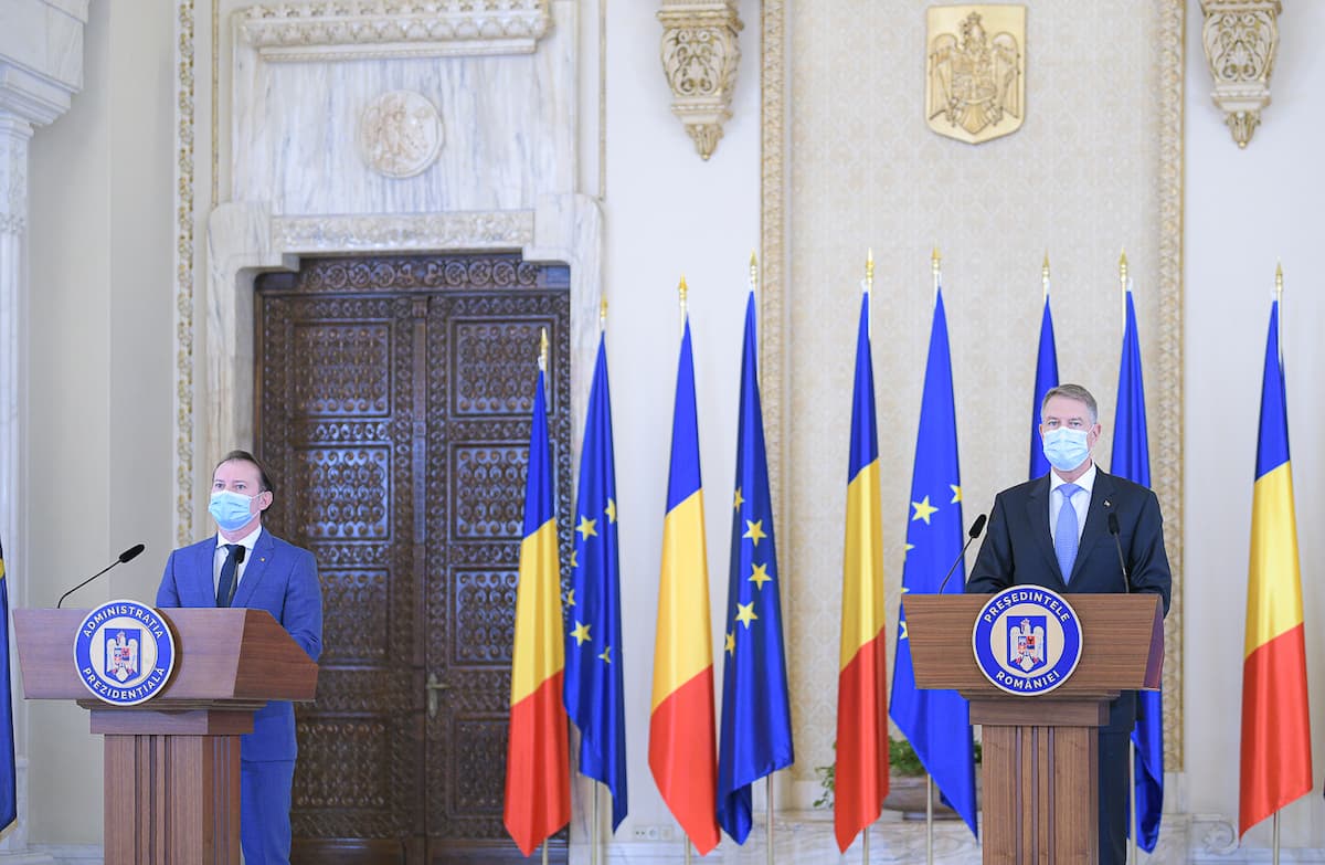 Romania's president designates former finance minister to form center-right cabinet