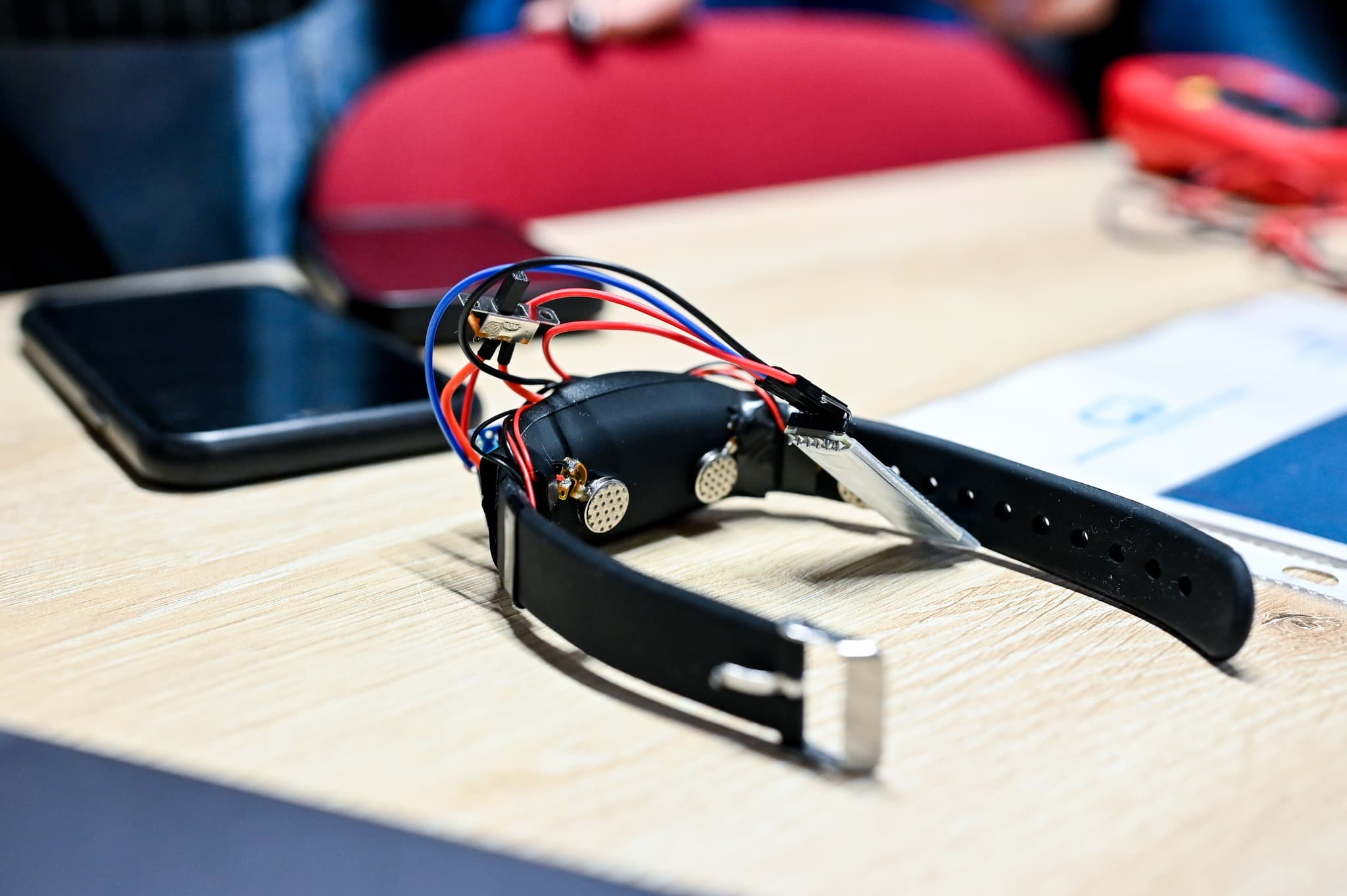 Romanian students invent bracelet that converts music into vibrations for people with hearing impairments
