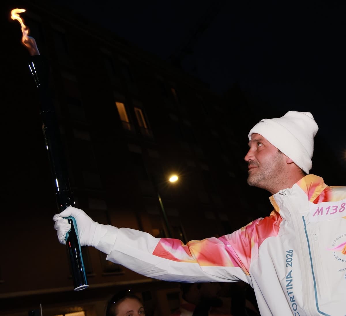 Romanian football star and Inter coach Cristi Chivu carries Olympic flame ahead of Winter Games