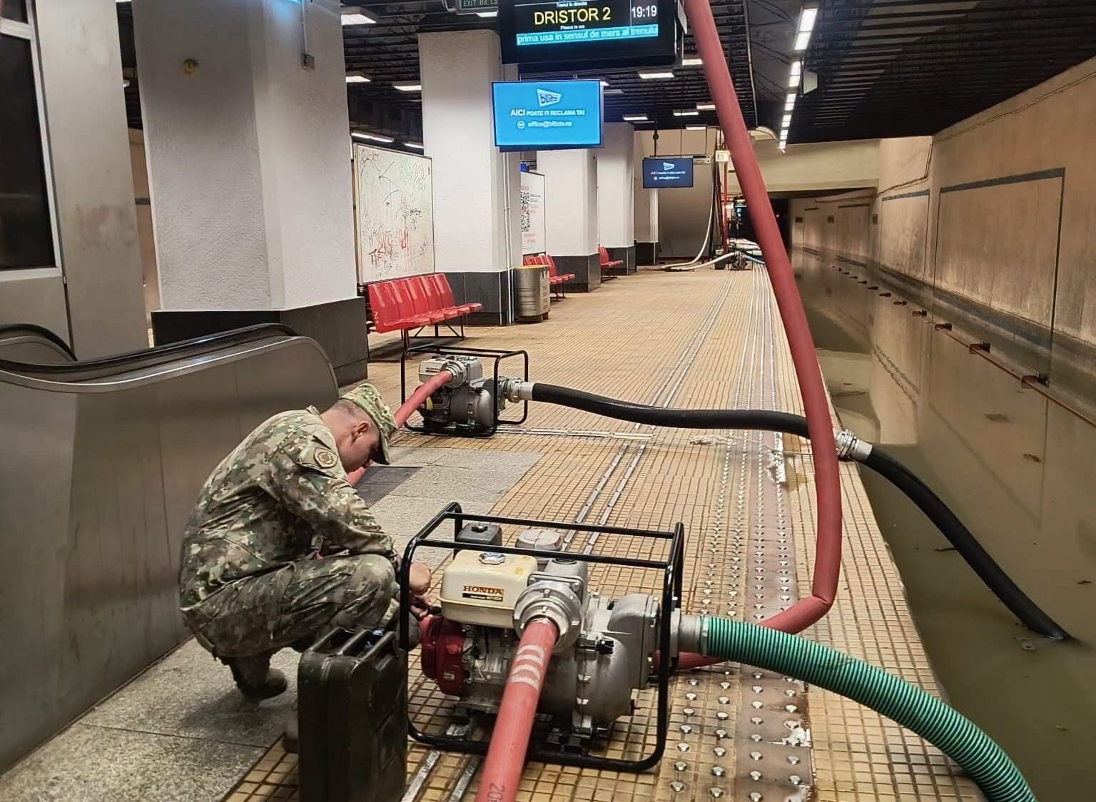 Busy Bucharest subway station reopens after storm flooding, millions of liters of water pumped out