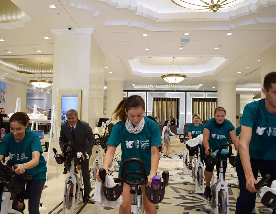 Romanian Prime Minister cycles for charity before speaking at conference in Bucharest