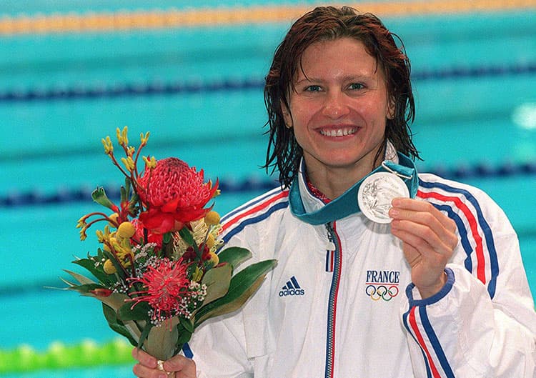 Romanian-born swimming champion named sports minister in French Govt.